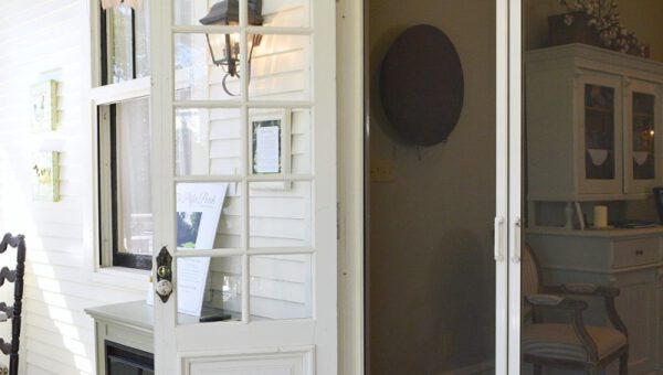 retractable double door screens on Southern American home
