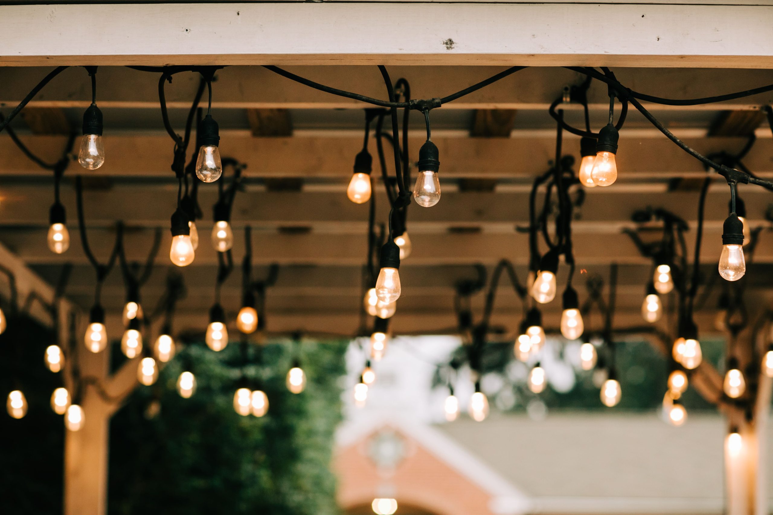 Lights hung on pergola or balcony for romantic atmosphere